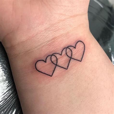 3 hearts tattoo|3 heart tattoos for women.